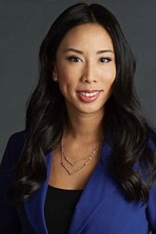 Tracy Tong as Toronto News Reporter