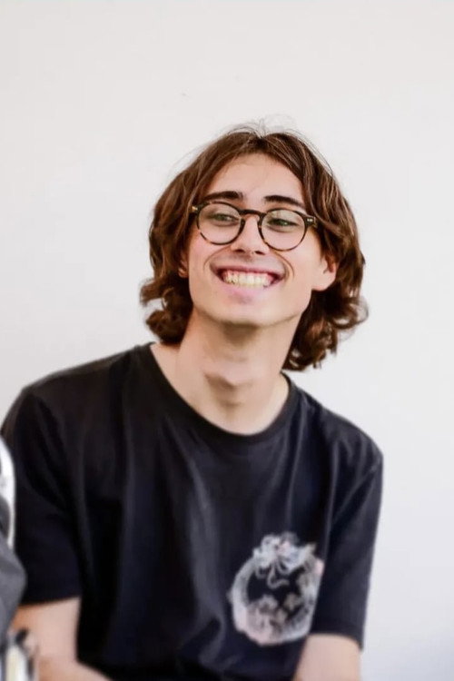 Joshua Ferrier-Mesguich as Clown / The Man with the Hourglass Watch