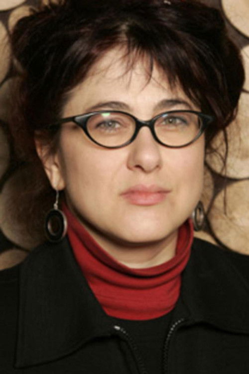 Louise Bourque as Lady behind the counter