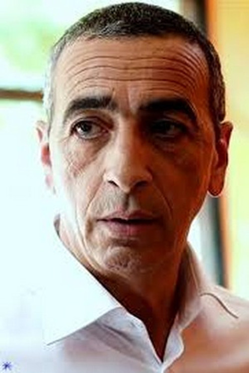 Smaïl Mekki as Kamel Béchéri