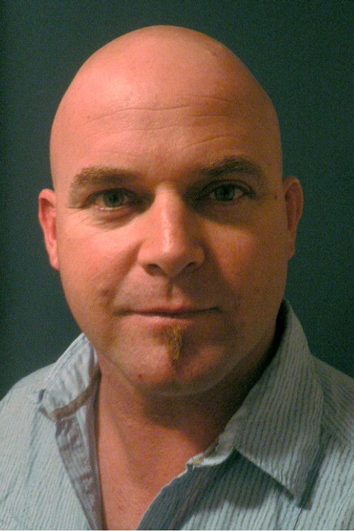 Des Wallace as Heavy Dude