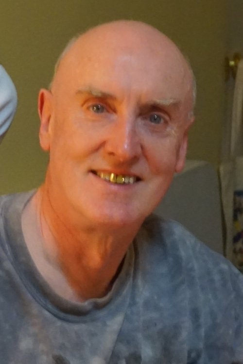 John Rogan as Mr. Carroll