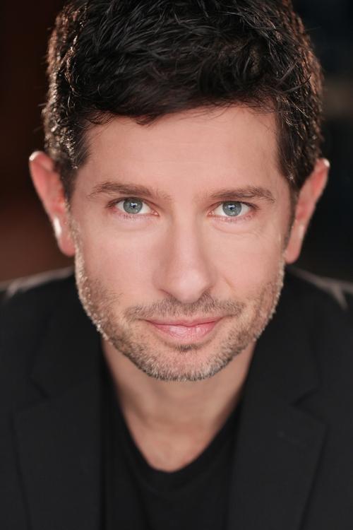 Tom Dacey Carr as Man in Black