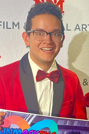 Alan De Lira-Richards as Buddy/Radio Announcer