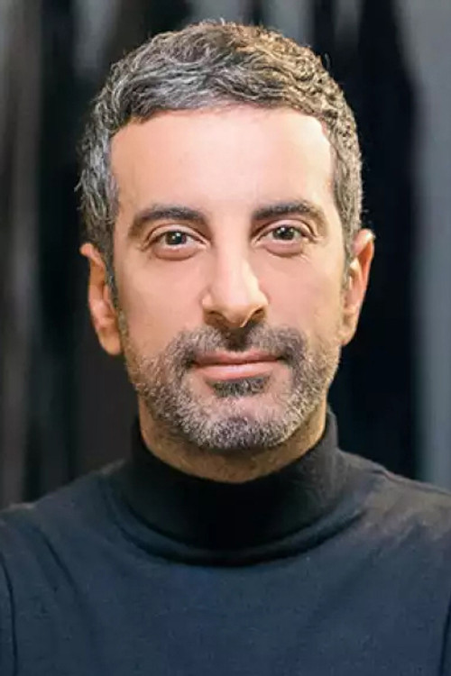 Stelios Koudounaris as Στέλιος Κουδουνάρης - Judge