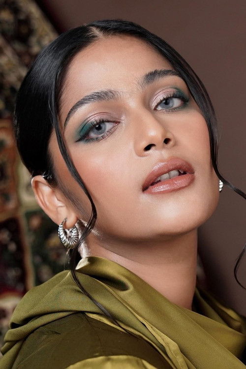 Tasha Siahaan as Ibu Saza