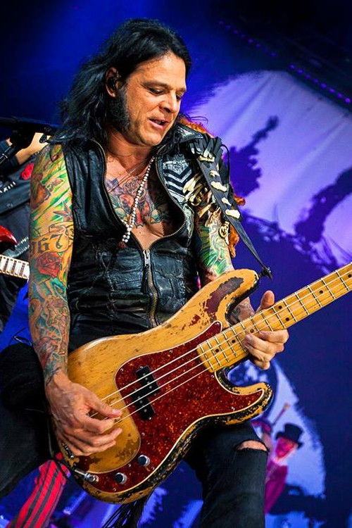 Chuck Garric as Self - Bass