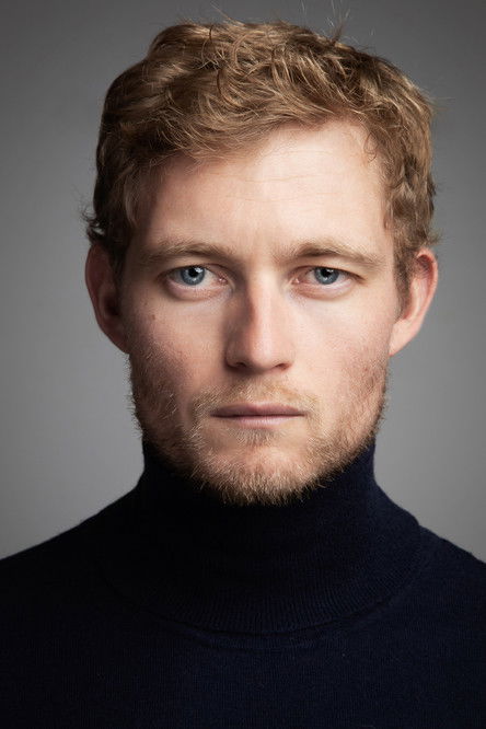 Oliver Smiles as Swedish Presenter