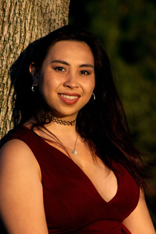 Sarah de Leon as Genevieve