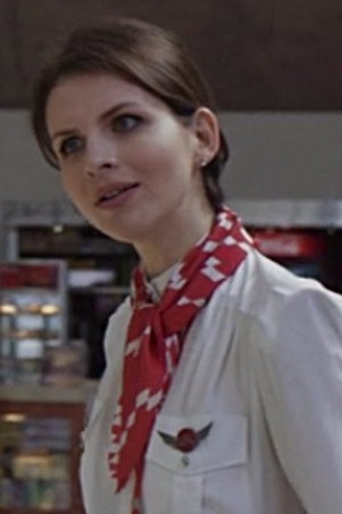 Giovana Ribeiro as Hôtesse aéroport