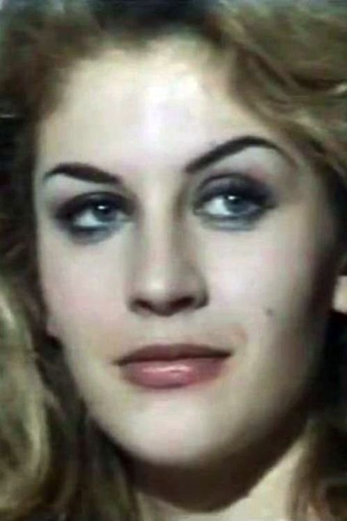 Valeria Favaro as Hotel Waitress