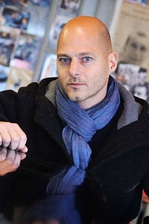 Raphaël Alazraki as Batman