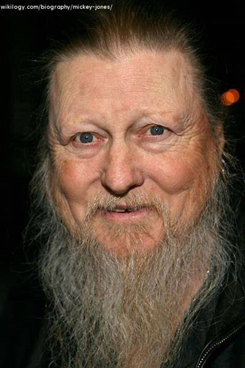 Mickey Jones as Neil