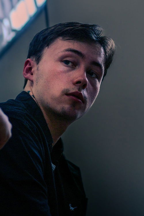 Josh Toomes as Extra