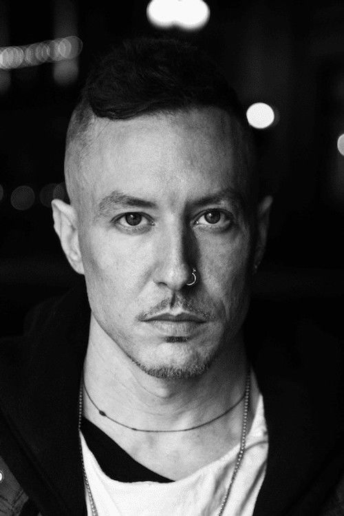 Greg Puciato as 