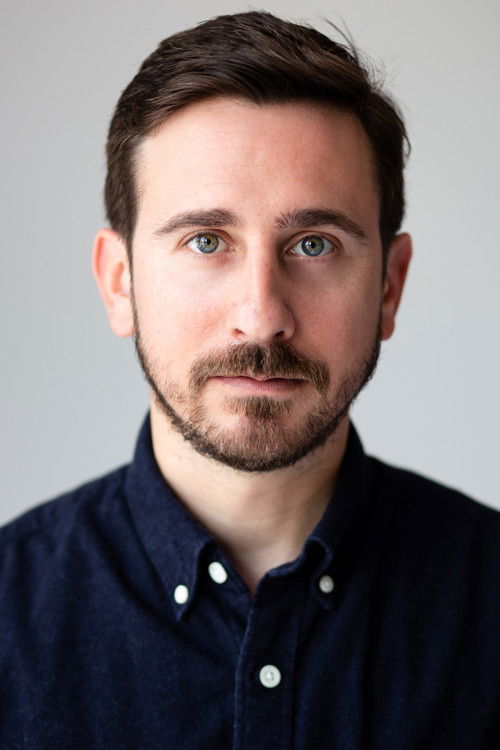 Andrew Gruen as Man on Train