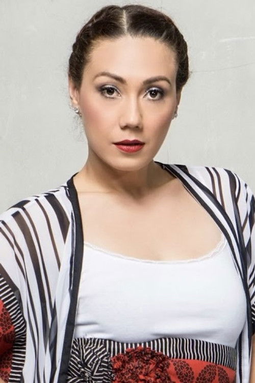 Jackline Kezia as Mama Aaron