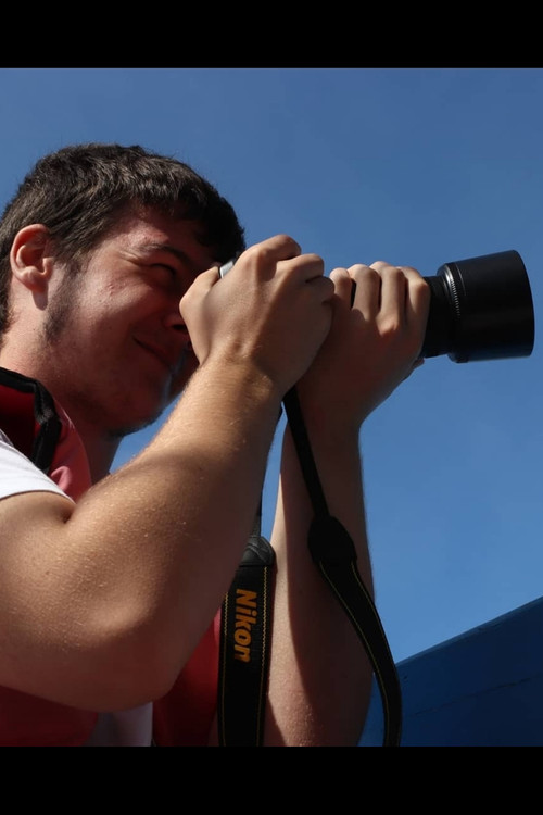 Jules Labouche as John