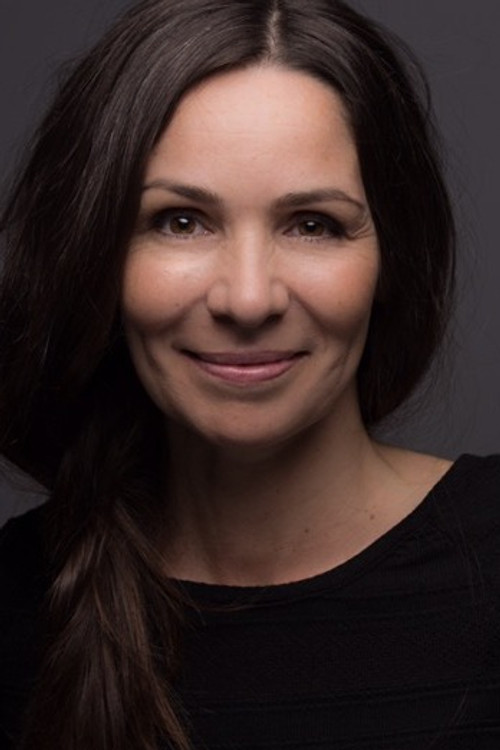 Mimmi Kandler as Self, wife of bank manager