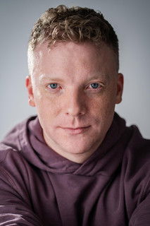 Joseph Cox as Bartender