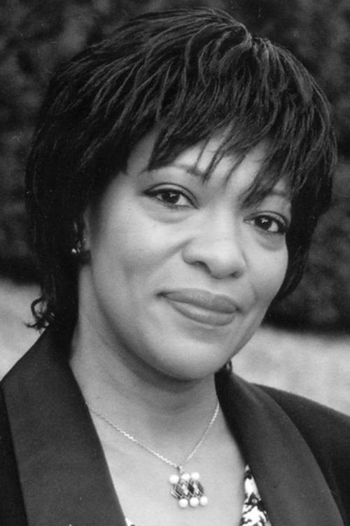 Tamu Blackwell as Girl in church pew