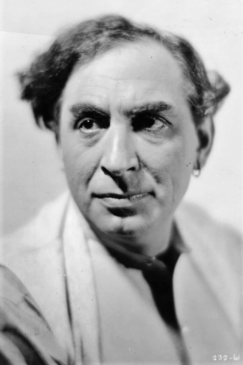 Mitchell Lewis as Captain of the Winkie Guard (uncredited)