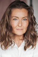 Oksana Voronina as The Farmer's Wife