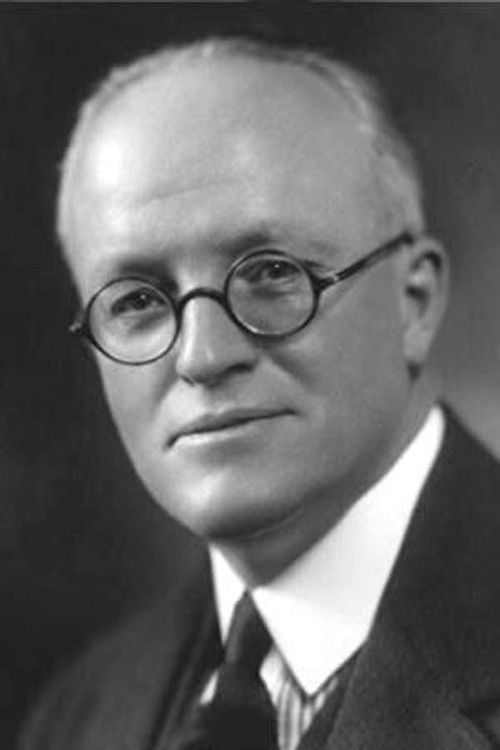 Hugh Walpole as The Vicar