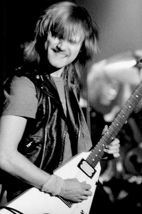 Michael Denner as Guitars