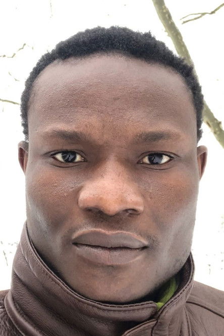 Urbain Guiguemde as Herr Nwachukwu (Nana)