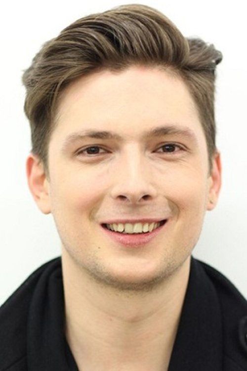 Artem Fedotov as guitarist at a school concert