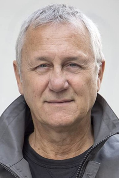 Gilles Plouffe as Store owner