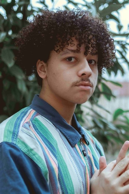 Enak Dogit as Young boy