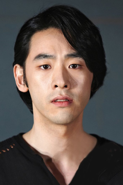 Dash You as Building Reception Man