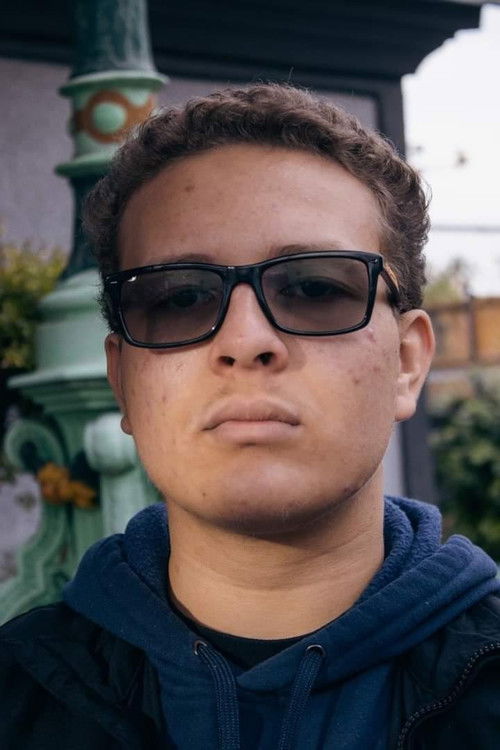 Luke Sell as Student