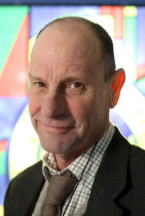 Philip Martin Brown as Guard