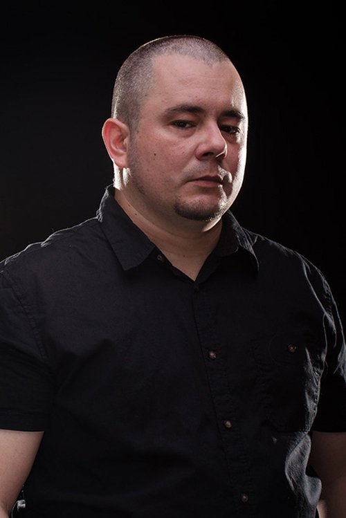 Miguel Ángel Aijón as El Socio (voice)