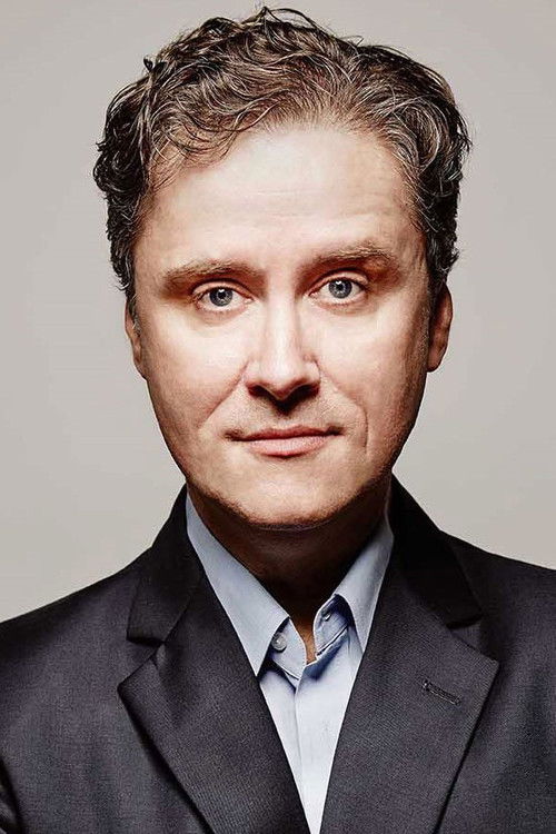 Richard Fidler as Host