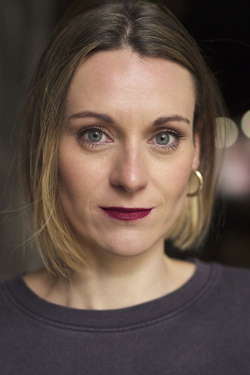 Emma Hartley-Miller as Janice