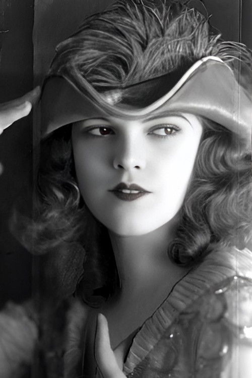 Jeanette Hackett as Louise Jupp - Clerk at the Hotel