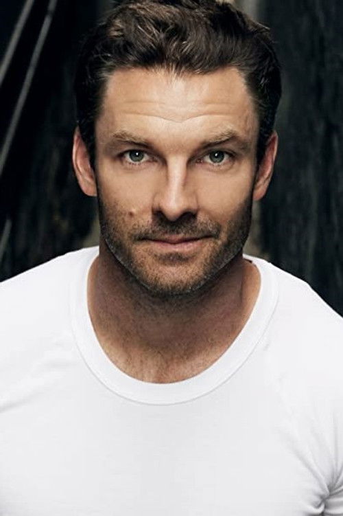 Guy Williams as Lorne