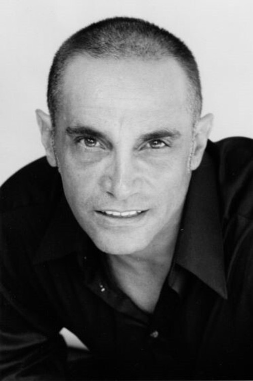 Americo Presciutti as Heinrich Schliemann