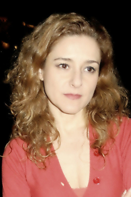 Evgenia Apostolou as Mrs. Farmaki