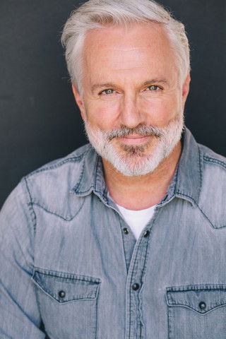 Shannon Lee Holmes as Exec 2