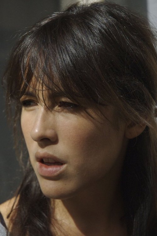 Olivia Forest as Professeur d’arts plastiques