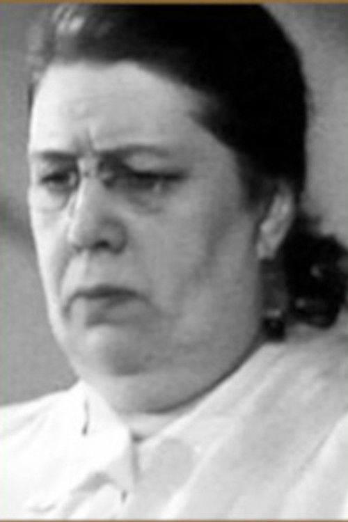 Vera Streshneva as Elena Gurova, his wife