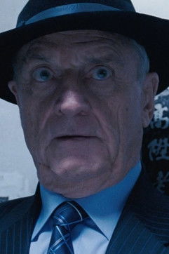 Theodore Thomas as The Commissioner