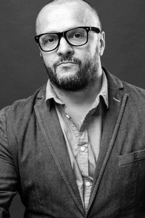 Igor Tikhomirov as Warden 3