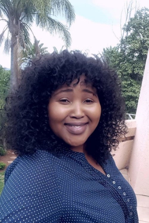 Portia Gumede as Air Hostess