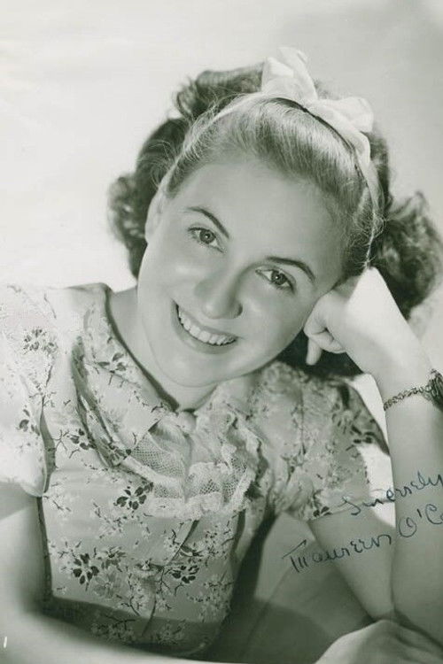 Maureen O'Connor as Nora